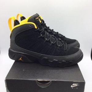 black and white and gold jordans